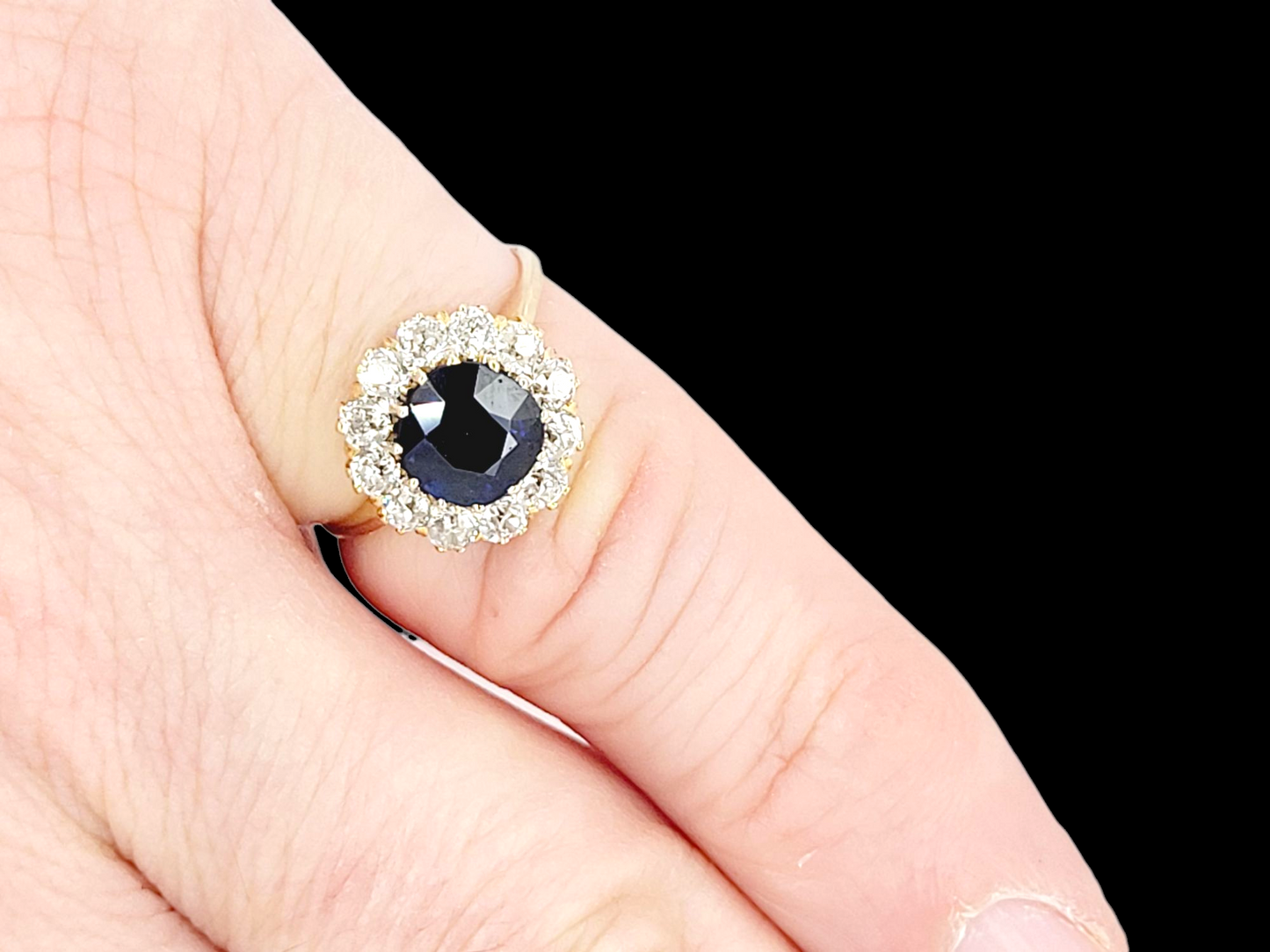 Antique sapphire and diamond cluster engagement
SKU: 8144