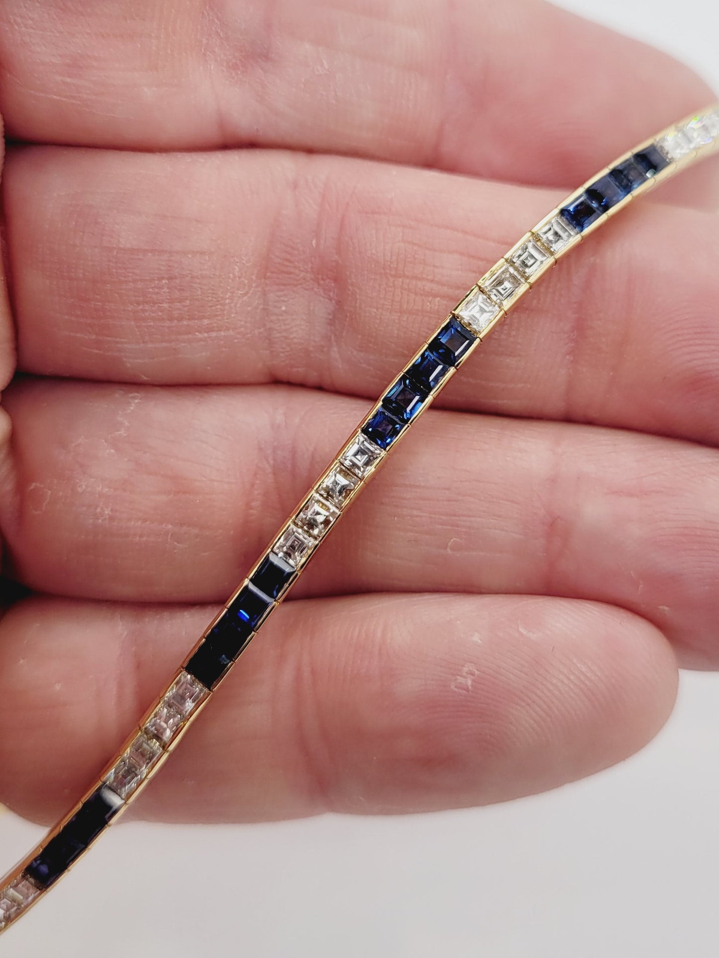 Sapphire and diamond calibre square Sapphire and diamond bracelet in 18ct yellow gold Sku 9011