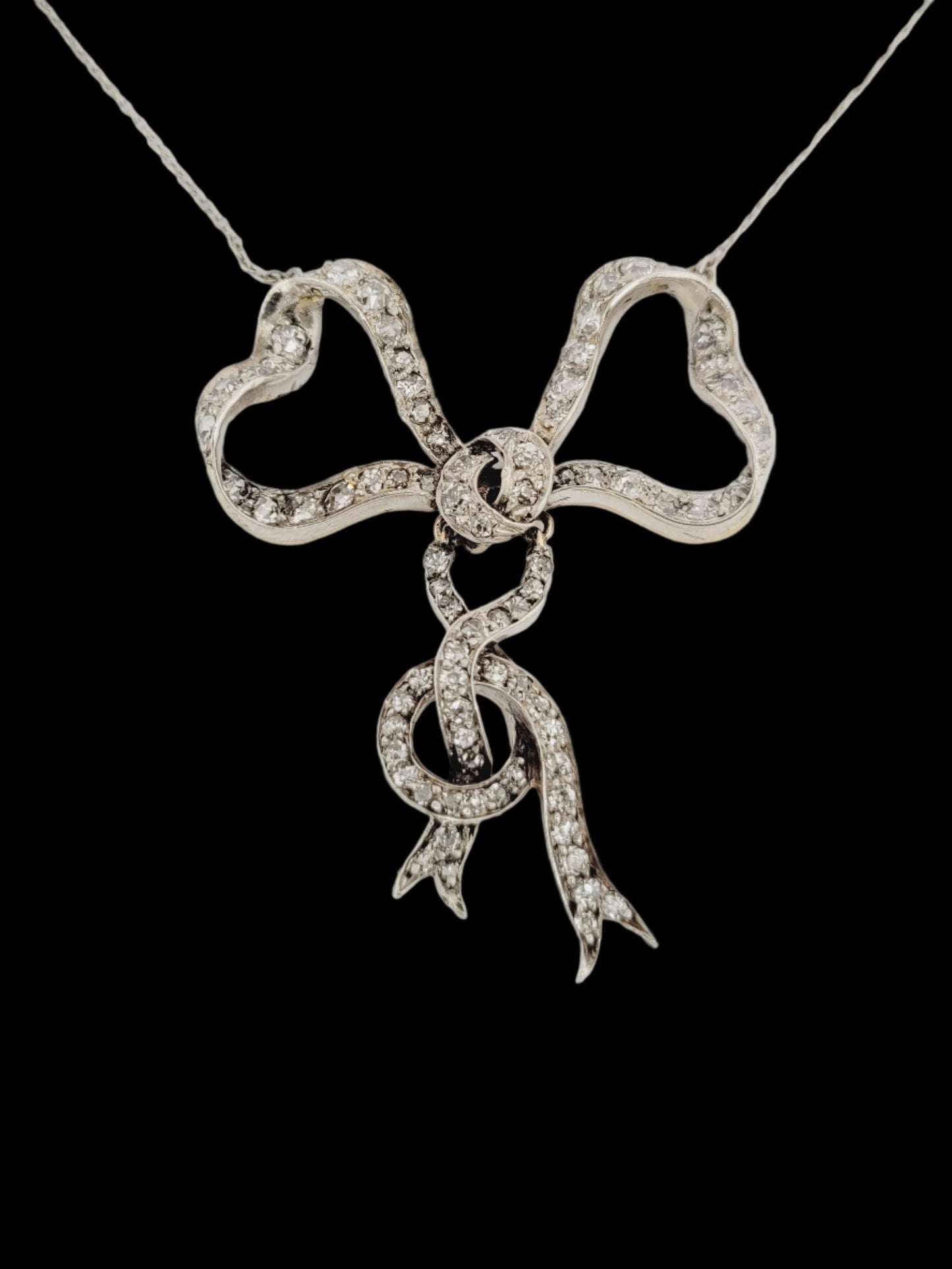 Naturalistic entwined antique diamond bow necklace
SKU: 8528