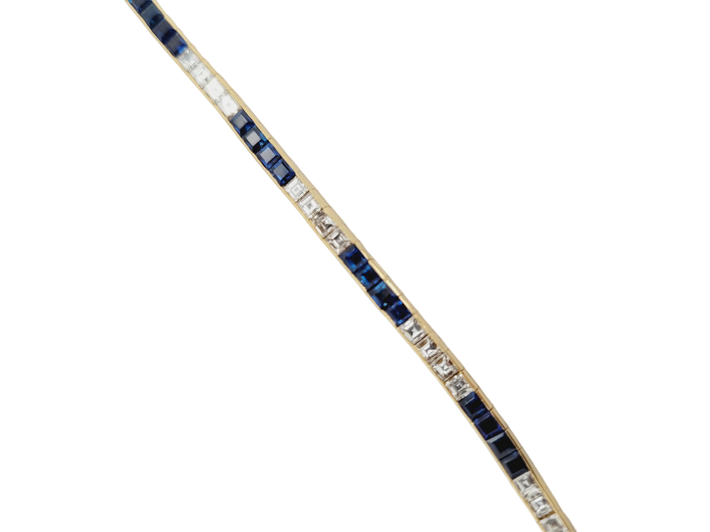 Sapphire and diamond calibre square Sapphire and diamond bracelet in 18ct yellow gold Sku 9011