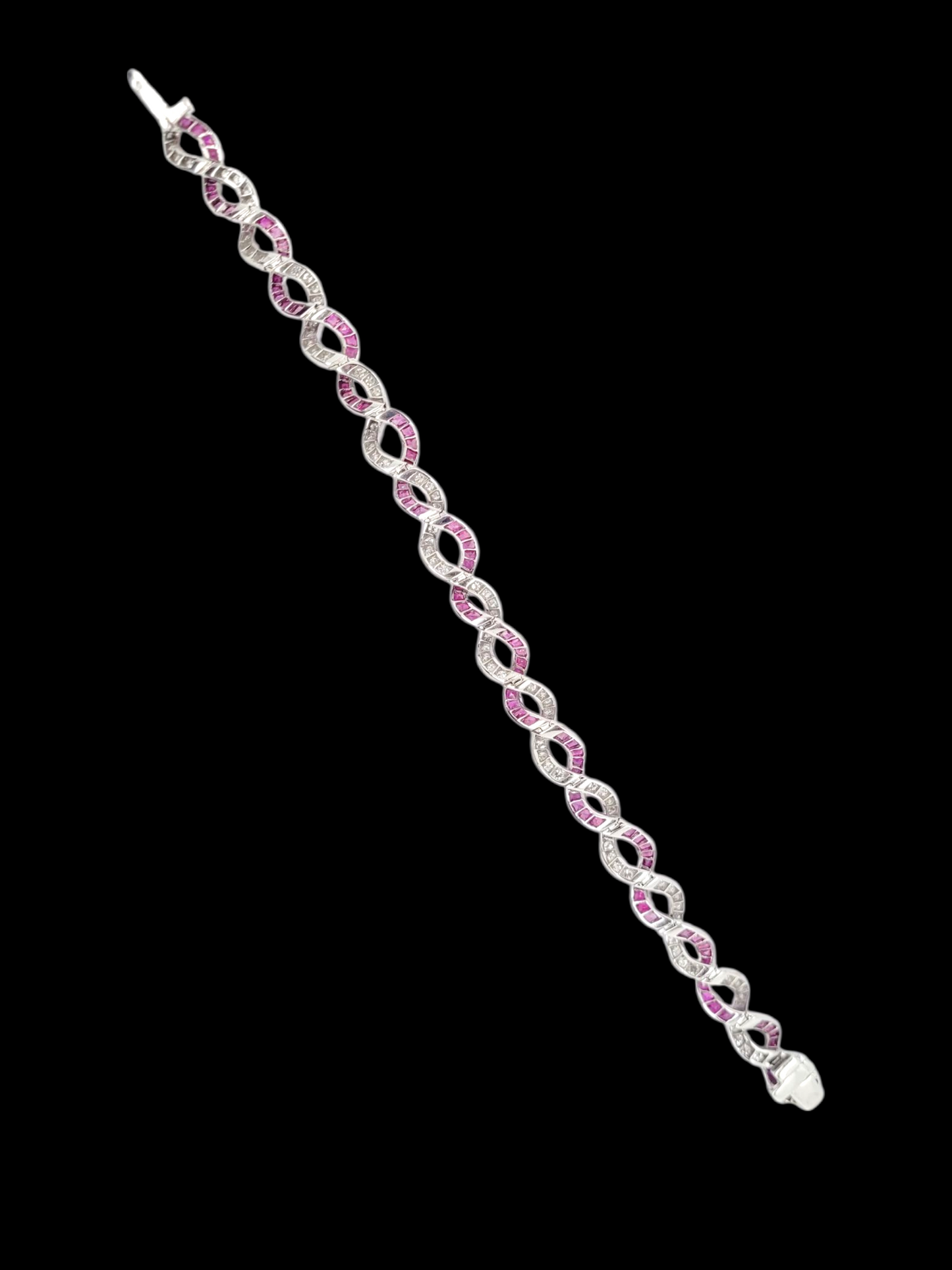 Fine entwined ruby and diamond bracelet
SKU: 8331