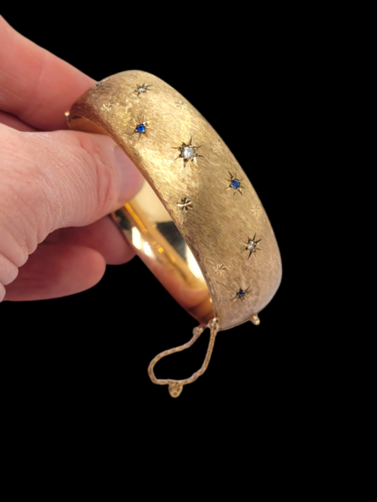 1961 Vintage wide gold bangle
SKU: 7791