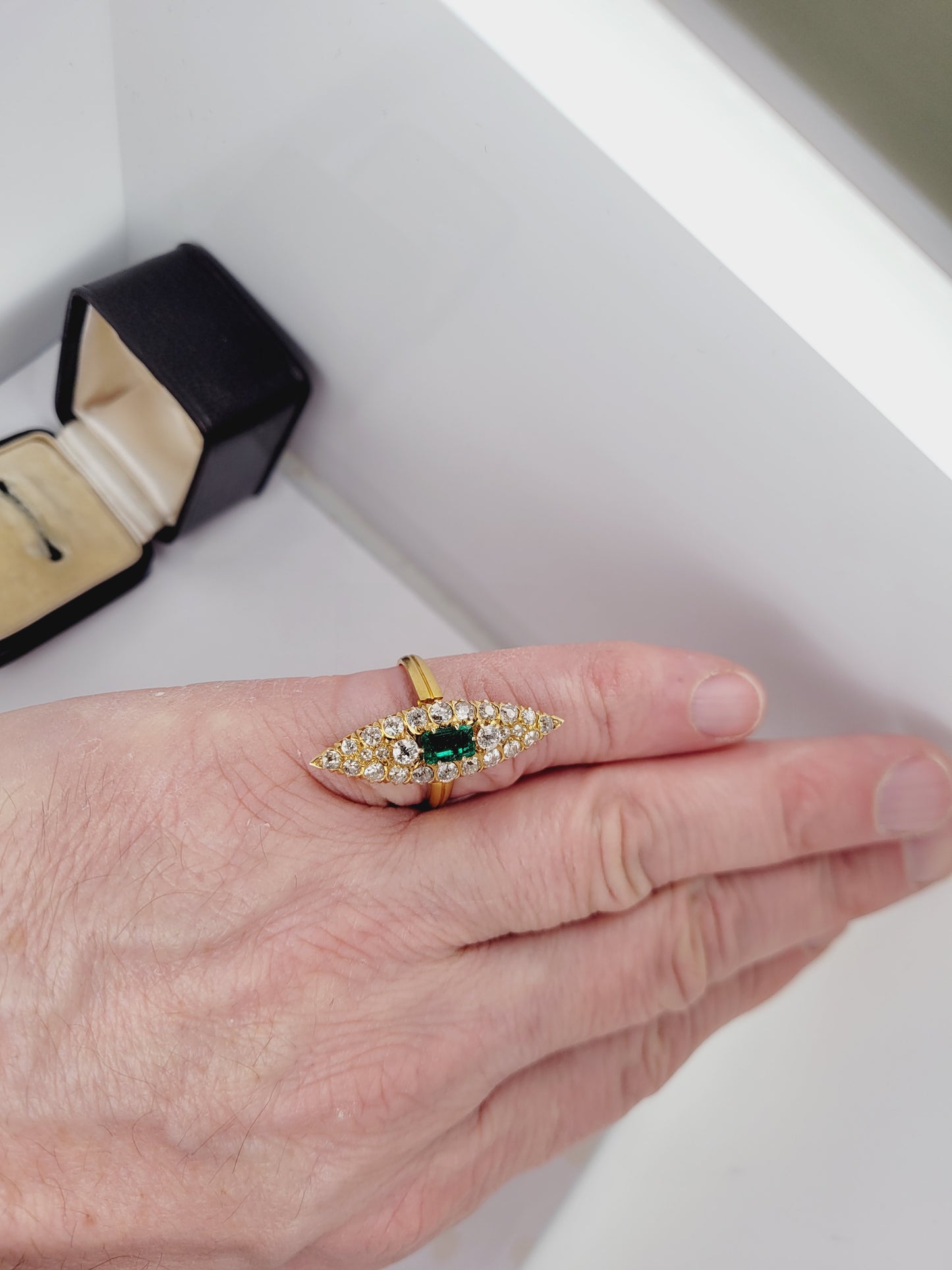 Antique emerald and diamond navette shaped ring
sku 8544