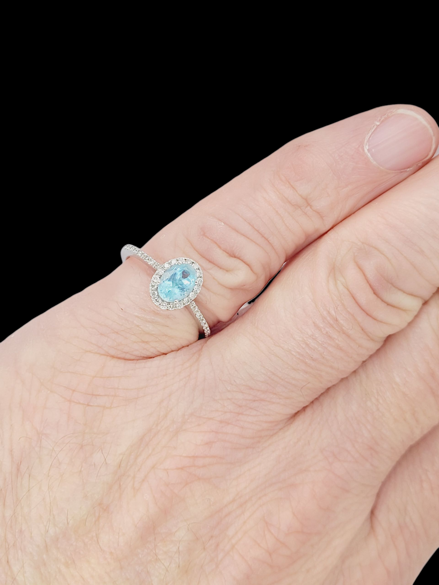 Oval aquamarine and diamond cluster ring
SKU: 8414