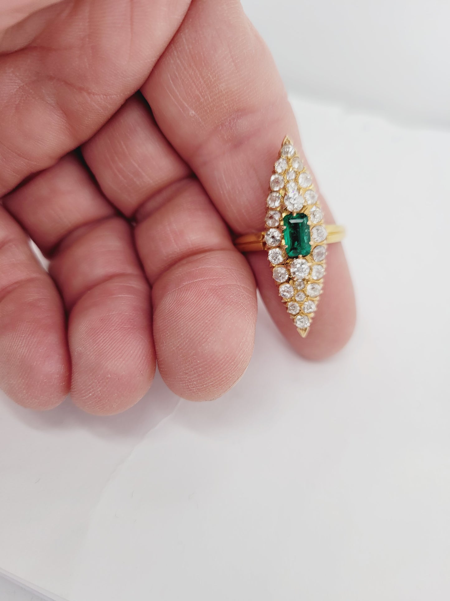 Antique emerald and diamond navette shaped ring
sku 8544