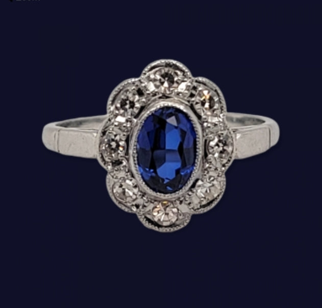 Sapphire and diamond cluster engagement ring
SKU: 5680