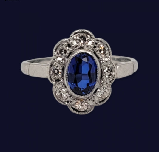 Sapphire and diamond cluster engagement ring
SKU: 5680