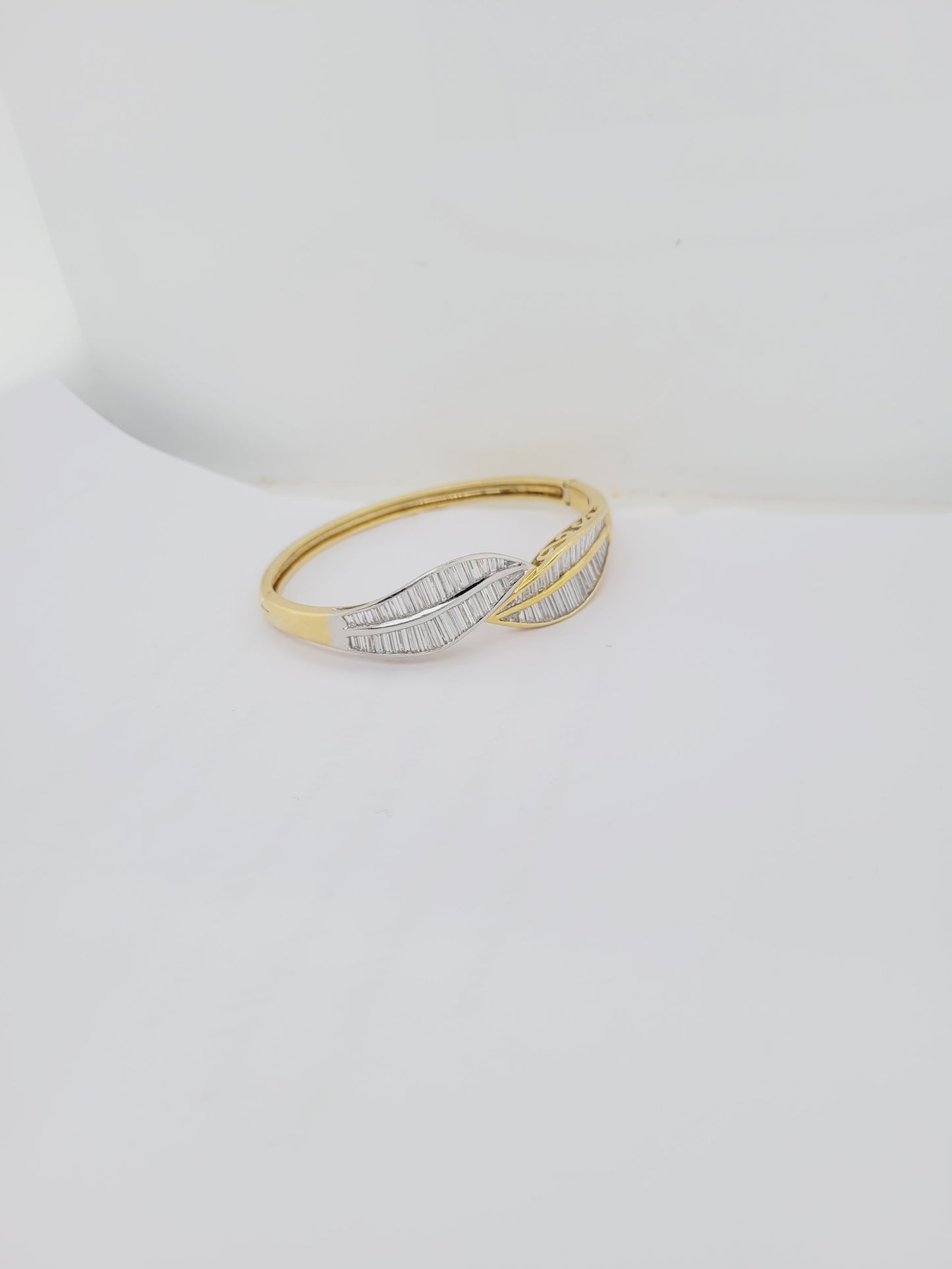 Baguette diamond bi colour gold leaves bangle sku 8691