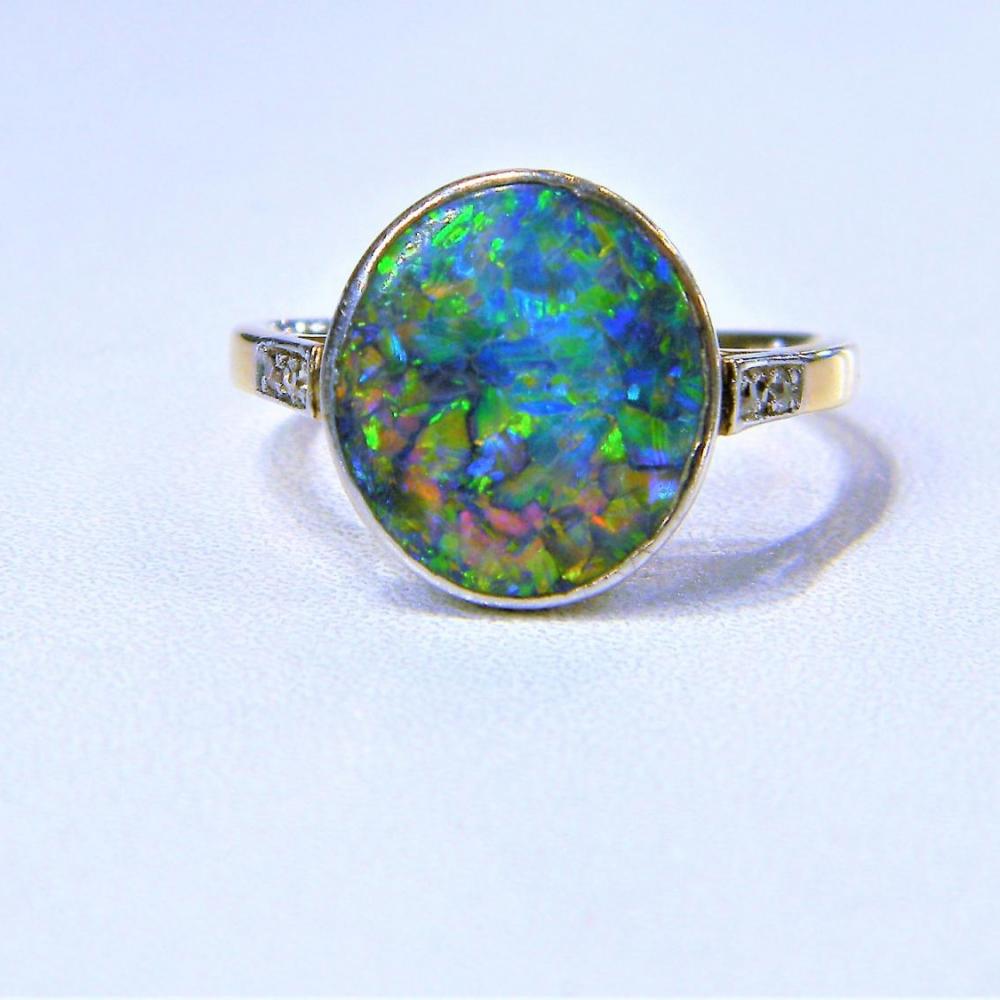 Antique black opal ring top