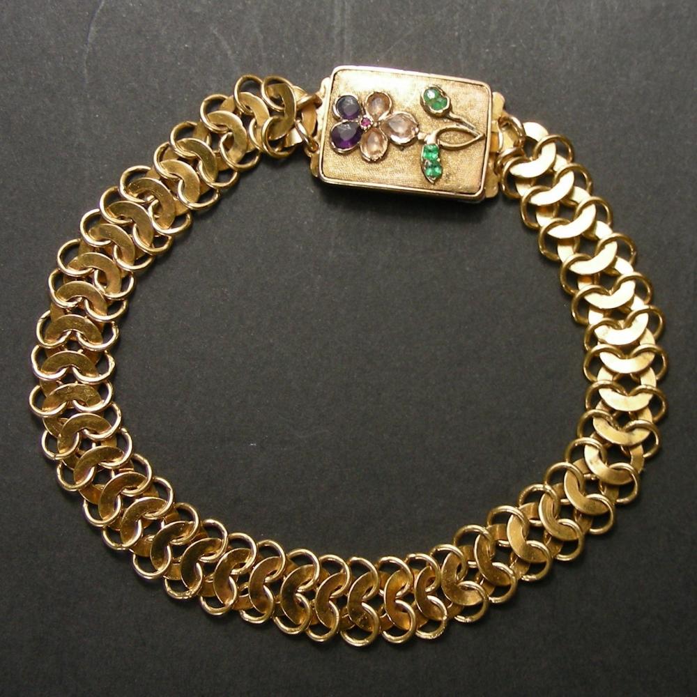 Gold bracelet with a gem set pansy to the clasp dated 1812 | DB Gems